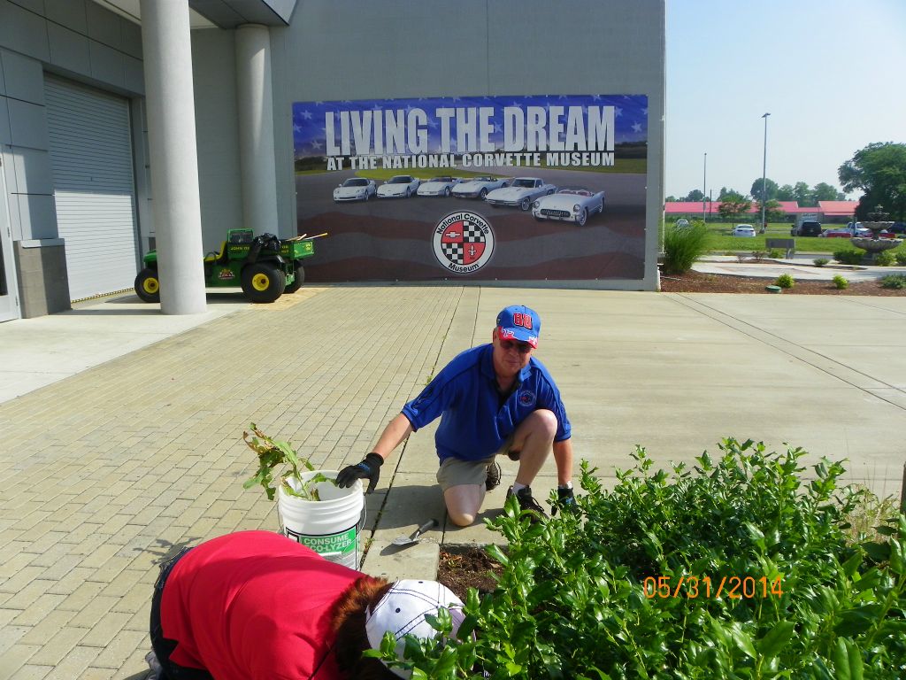 Karen Kelly helps outside while spouse Terry supervises - not sure if this is "Living the Dream."